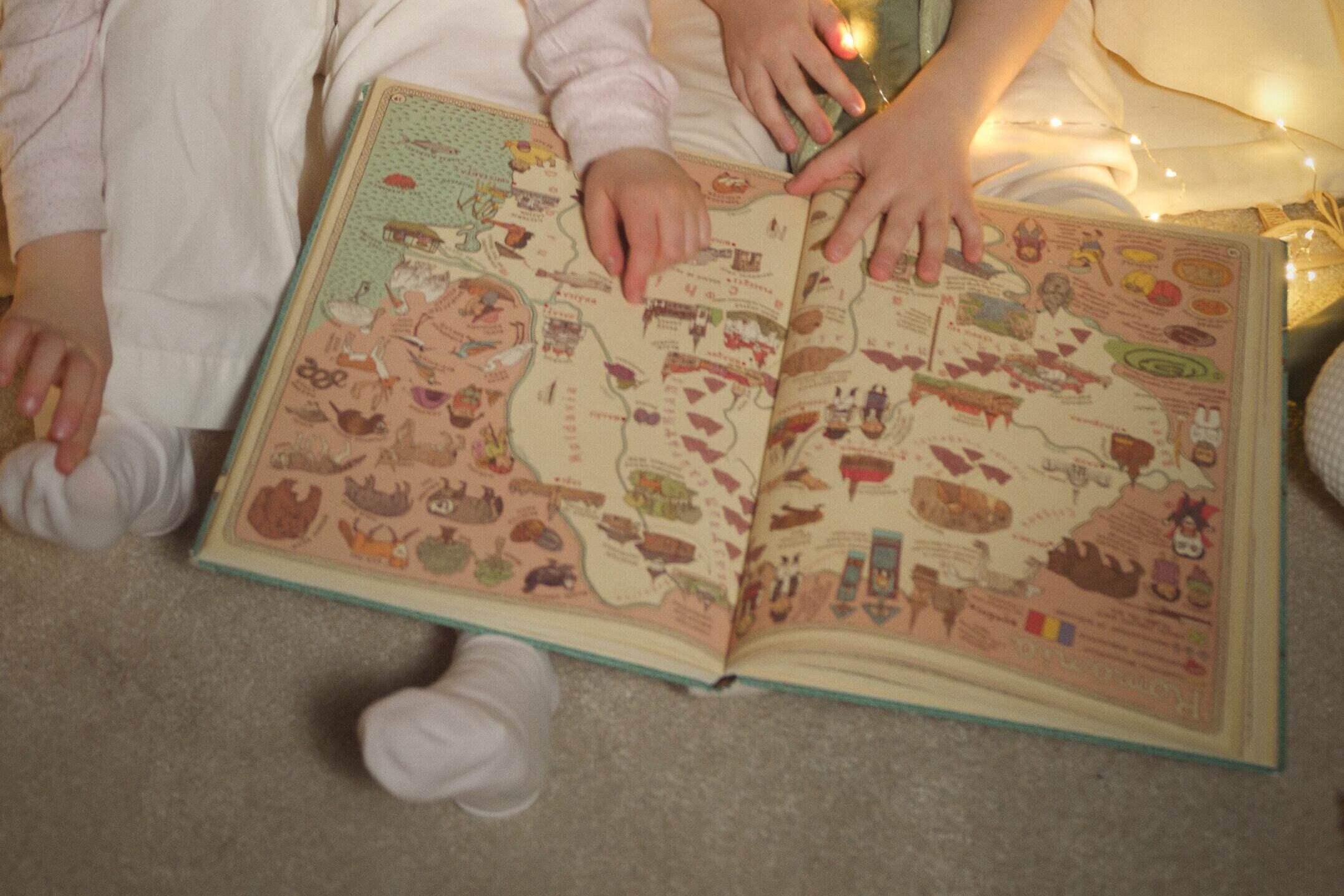 children holding a story book