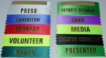 name tag labels stating persons' role at event